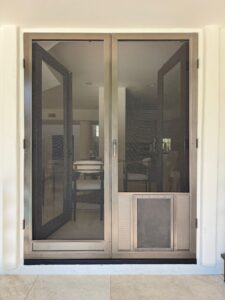 Residential French Door with Swinging Screens and Pet Screen Installed