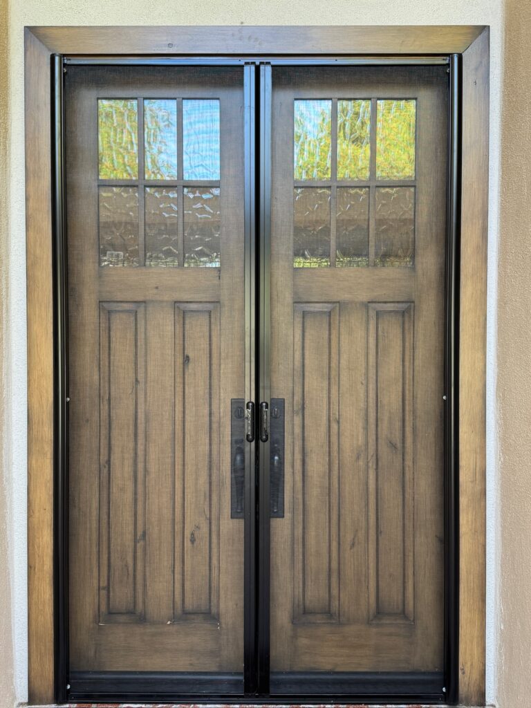 retractable screen installed on double front door