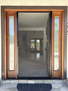 retractable screen installed on front door open door view